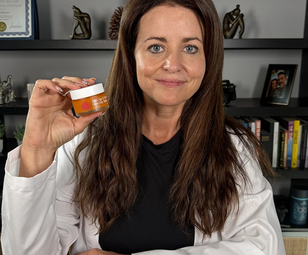 Dr. Jessica Peatross holding Frøya Anti-Age & Instant Glow Day Balm